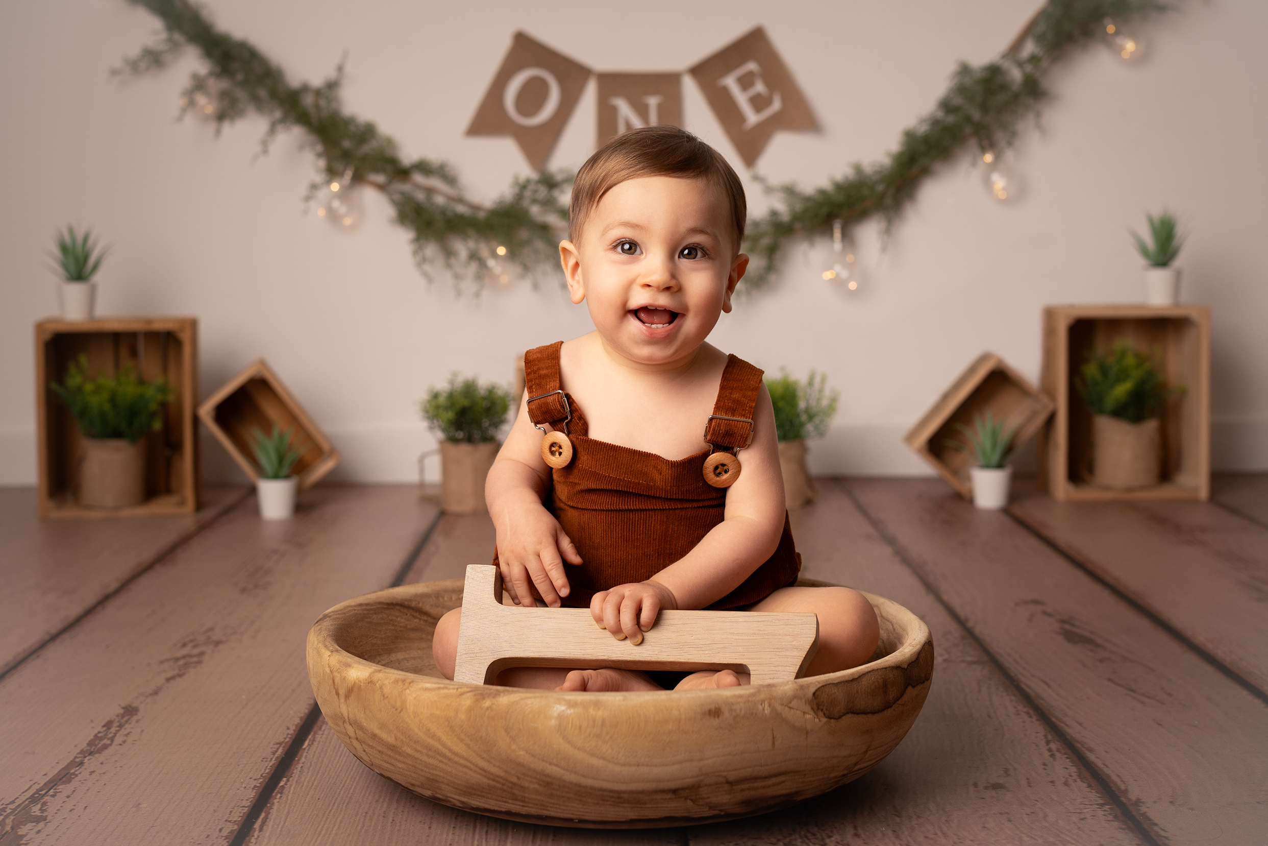 Séance photo bébé studio 1 an - anniversaire garçon décor boho naturel